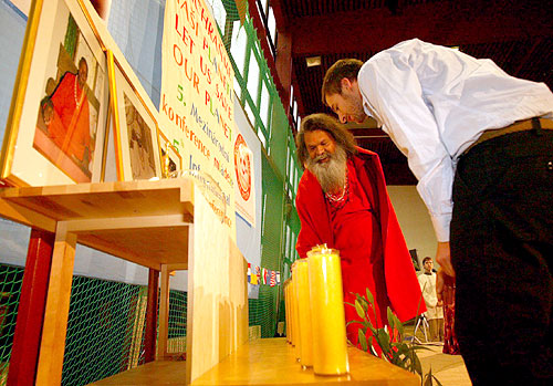 Lighting candles at the opening of the Conference